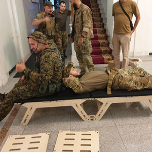folding bed with soldiers